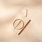 Barrette à cheveux ronde dorée