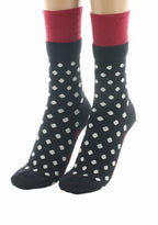 CHAUSSETTES FEMME EN LAINE MÉRINOS À POIS NOIR ET IVOIRE